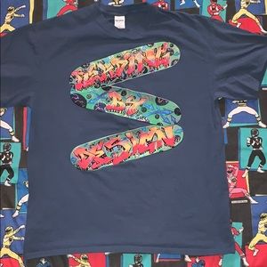 Skateboard tee reading by design